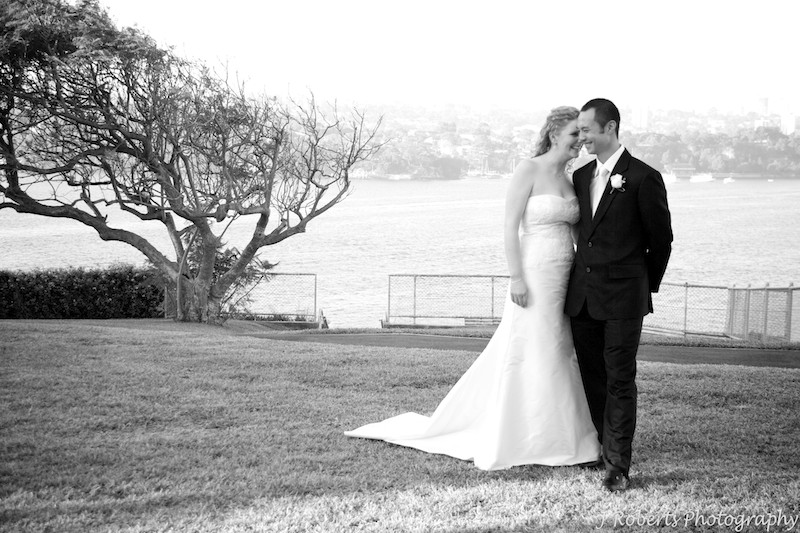 B&W of bride and groom laughing - wedding photography sydney